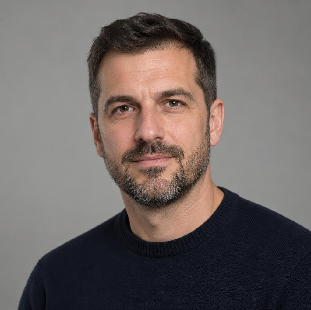 Studio portrait of a Croatian man with a short beard